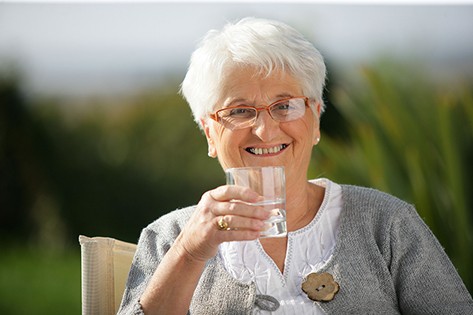 bigstock-Senior-woman-with-a-glass-of-w-44770198